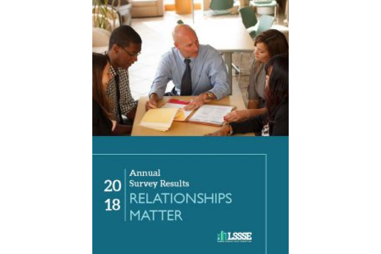 A book cover titled, "Annual Survey Results 2018: Relationships Matter." The top half of the cover is a photo of five people of diverse races and genders sitting around a table with a laptop and papers. They are looking at the person at the head of the table who is speaking. The bottom half of the cover is a blue background with the title written in white text, and a small green and white logo at the bottom right.